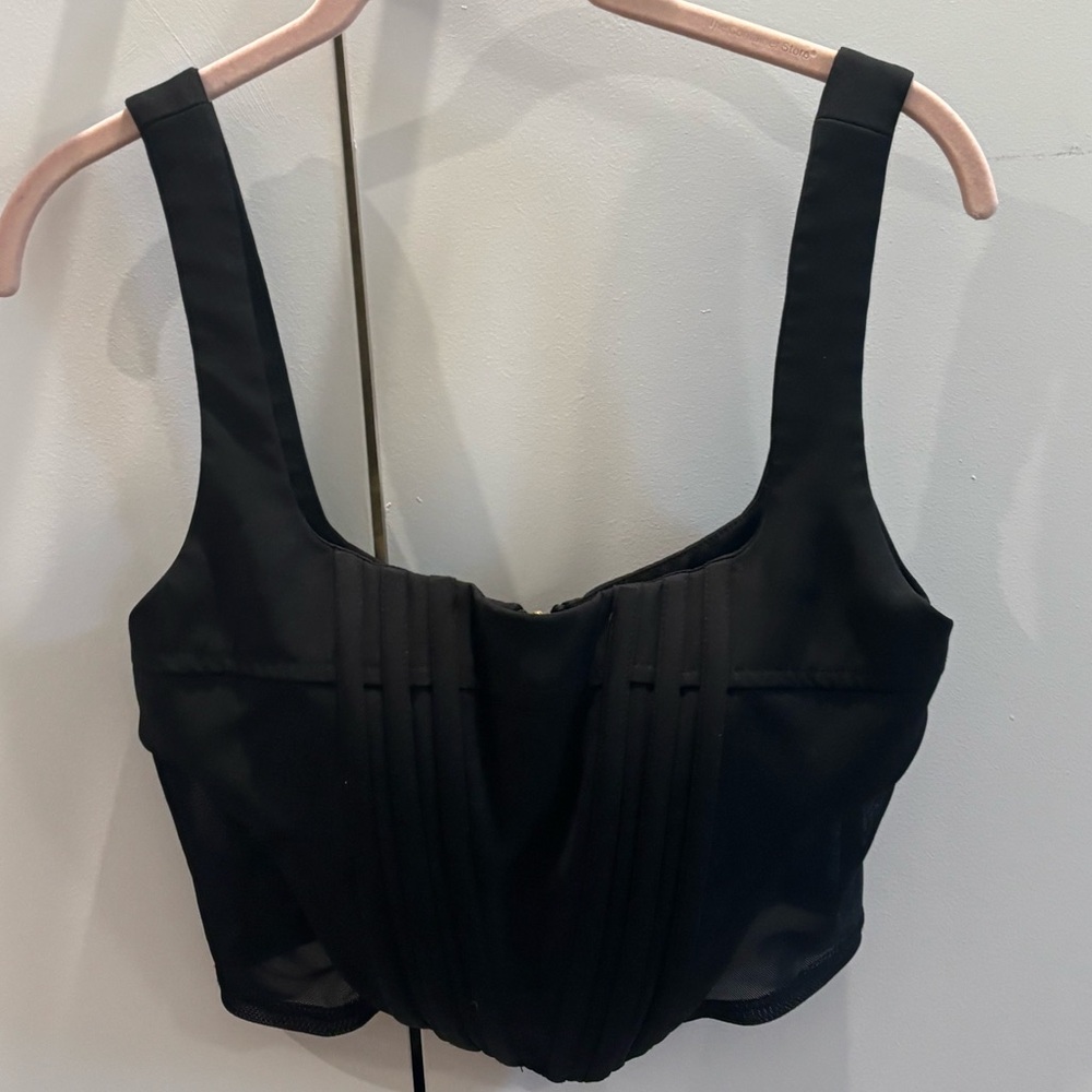 Black corset crop top with mesh insets, size M